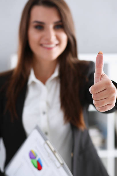 istock Beautiful smiling woman showing ok or approval 873746622