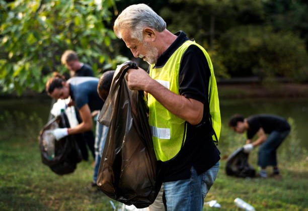 Ecology group of people cleaning the park