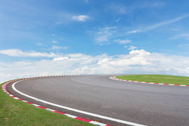 istock Asphalt Road with green grass ,blue sky background. 873758200
