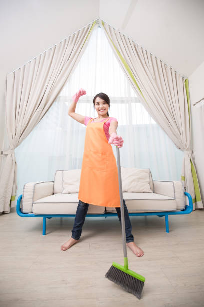 istock woman in living room 873761438