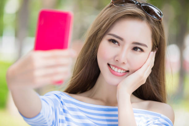 istock woman selfie happily 873762046