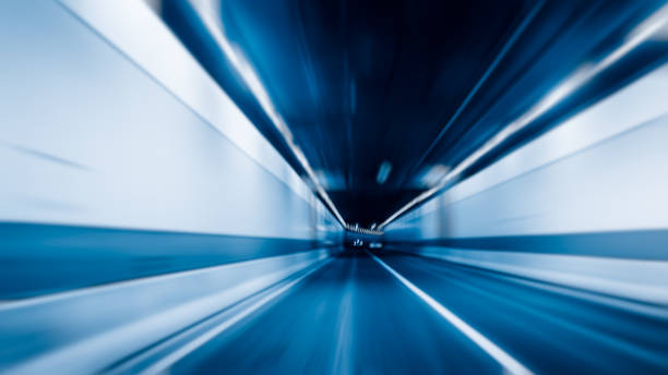 istock abstract car driving through tunnel, blue tone images 873768928