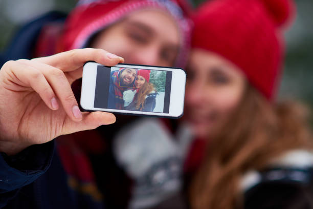 istock Adorable Couple Taking Selfie 873772232