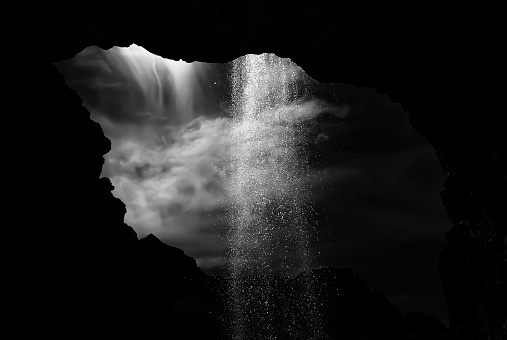 Black and white abstract look taken from back of waterfall in cave in the Grand Canyon, Arizona