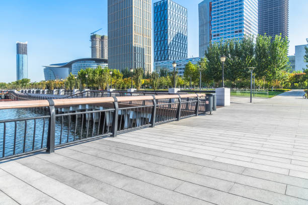 istock empty pavement and modern buildings in city 873775208