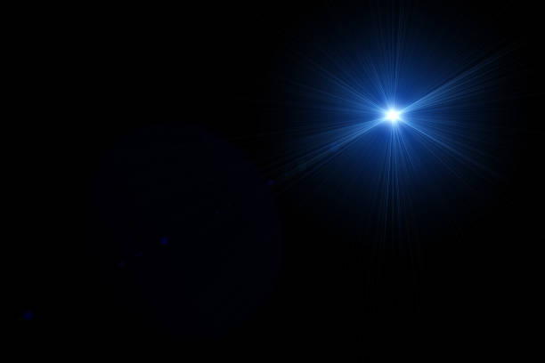 istock digital lens flare,sun burst on black background. 873776620