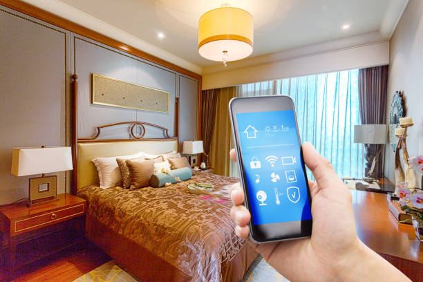 istock smart phone with smart home with modern bedroom 873779792