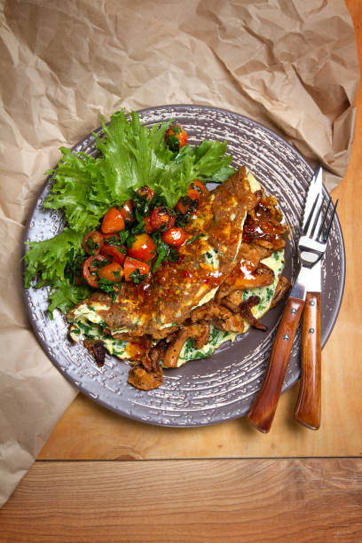 istock Squash and parsley frittata with chanterelles and cherry tomatoes 873779970