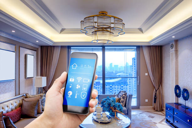 istock smart phone with smart home with modern living room 873783848