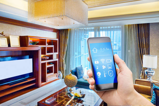 istock smart phone with smart home with modern living room 873784266