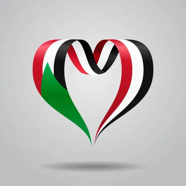 Vector illustration of Sudanese flag heart-shaped ribbon. Vector illustration.