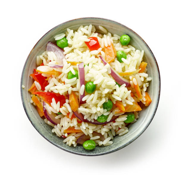 istock bowl of boiled rice with vegetables 873799726