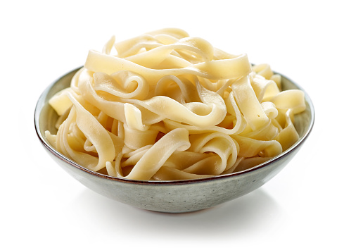 bowl of egg noodles pasta isolated on white background