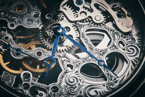 The intricate clockwork mechanism of a watch.