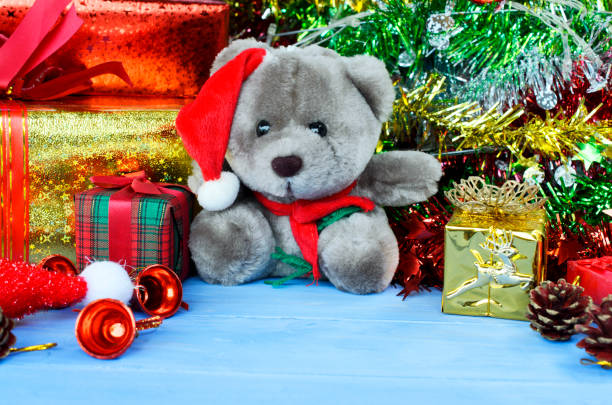 istock Teddy doll with santa hat and Christmas decorations backgrounds 873814842