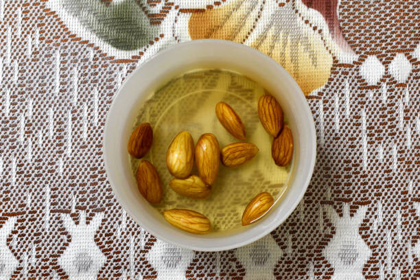 istock Soaked almonds loosing color 873818460