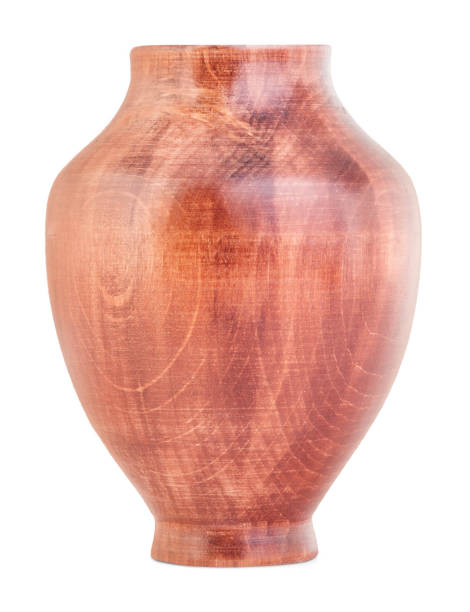 istock A wooden vase is isolated on a white background. 873818474