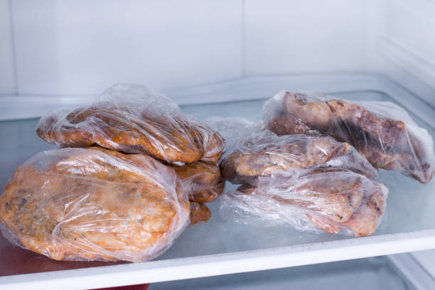 istock Fried pork fillet in a refrigerator. Ready meals. 873821090