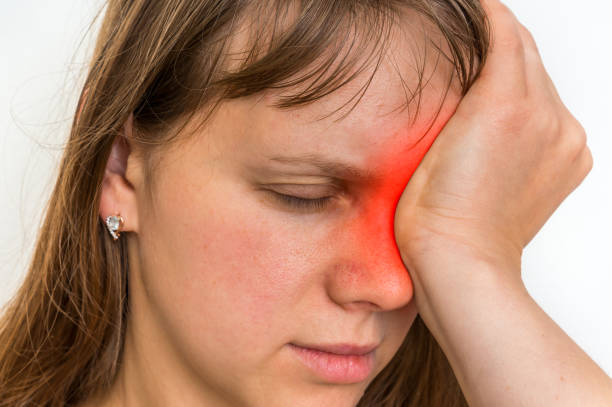 istock Woman with eyes pain is holding her aching eye 873825866