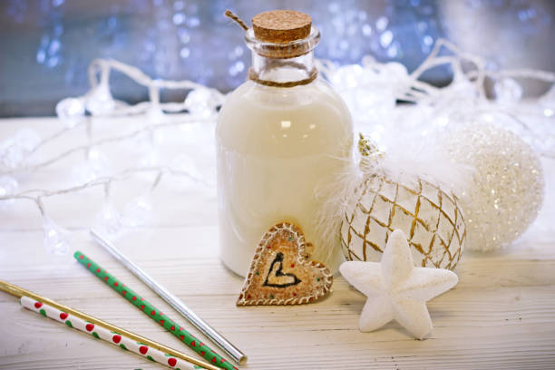 istock Christmas composition, a bottle of milk and balls 873837330