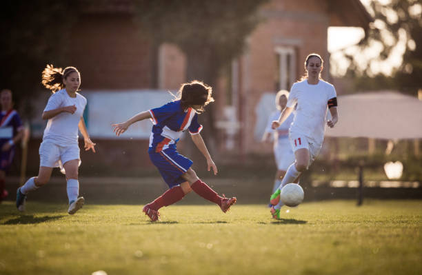 istock Passing the ball on woman's soccer match! 873837942