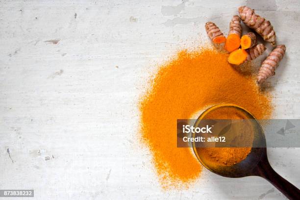 Turmeric Roots And Powder Stock Photo - Download Image Now - Turmeric, White Background, Ground - Culinary