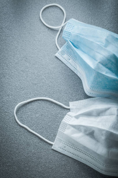 istock Disposable sterile flu masks on grey background 873841196