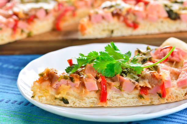 istock Piece of homemade pizza on a plate 873842540