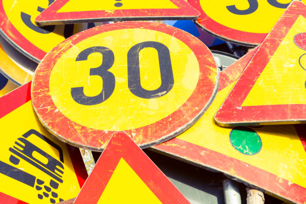 istock Bunch of road signs stacked after use 873849060