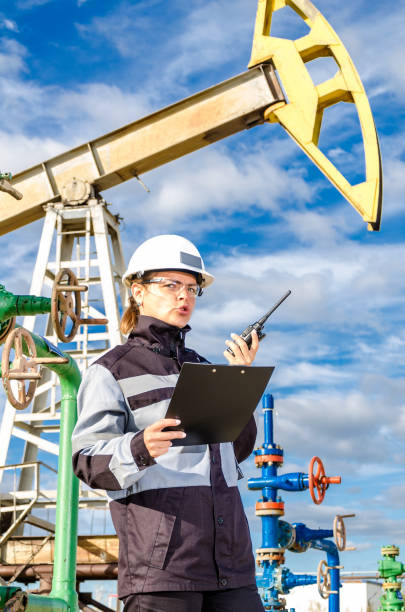 istock Woman engineer in the oilfield 873849242