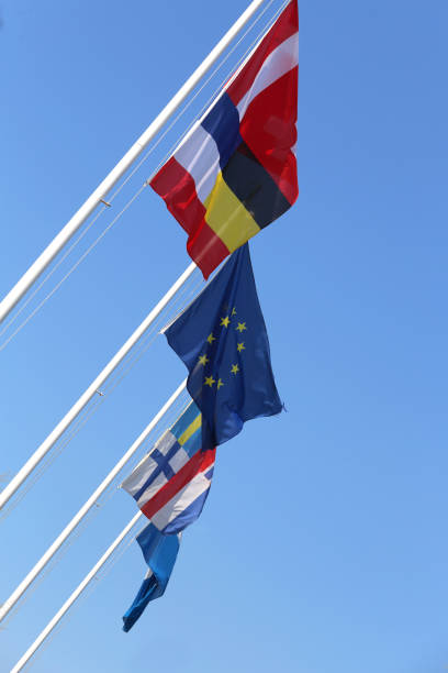 istock flags and the european flag and blue sky on background 873853054