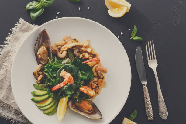 istock Warm salad with grilled seafood flat lay 873853310