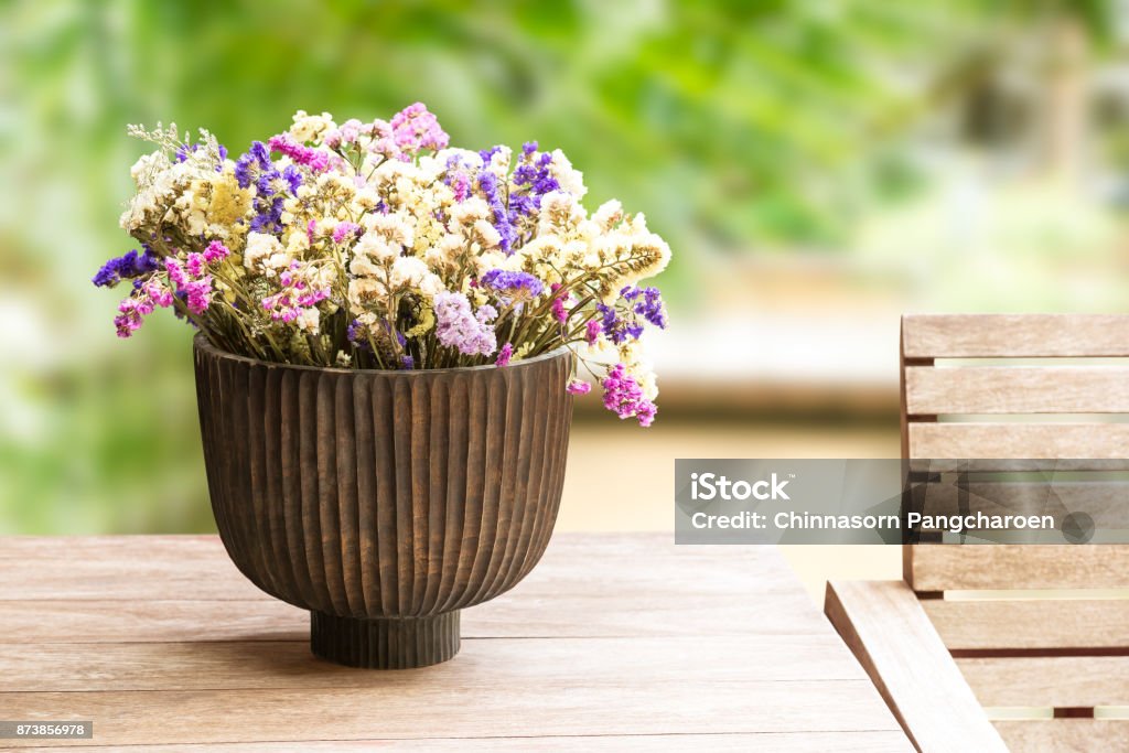 Dry flower in vase Beautiful dry flower in wooden vase for decoration Basket Stock Photo