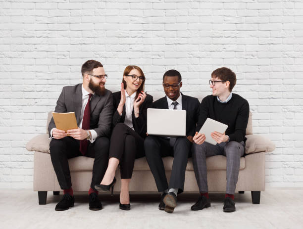 istock Team building, multiethnic team sitting on meeting 873861168
