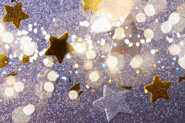 istock Silver and golden christmas stars 873862240