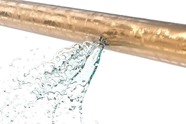 leaking pipe with water splash - burst pipe imagens e fotografias de stock