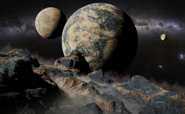 istock alien landscape with planet, moons and the Milky Way galaxy (3d render, elements of this image are furnished by NASA) 873865330