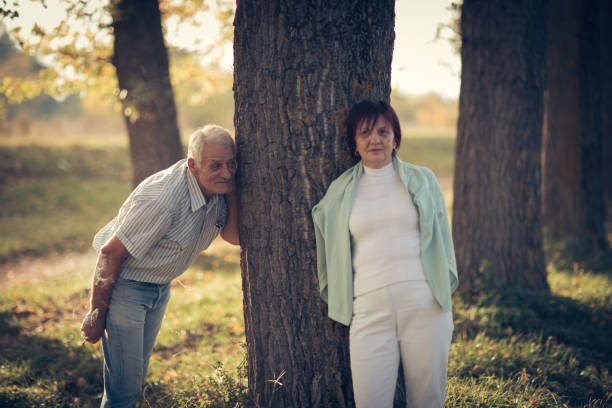istock Senior couple enjoying autumn in park 873865432