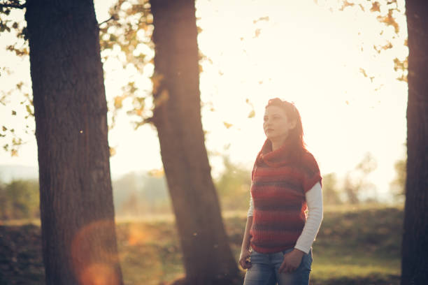 Woman enjoying autumn in nature