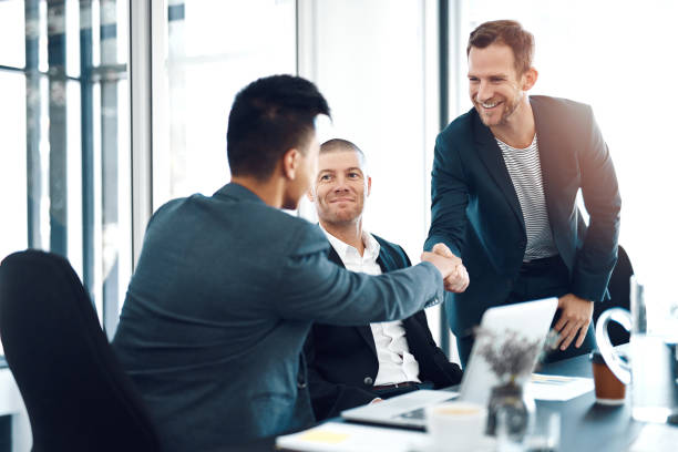 istock Partnering up to expand the business 873867006