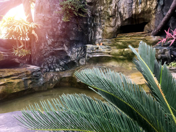 istock Simulated waterfall in the park. 873869410