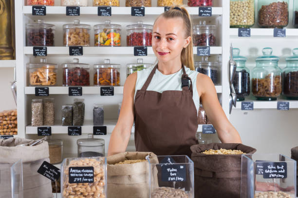 istock Young woman is standing on her workplace 873874040
