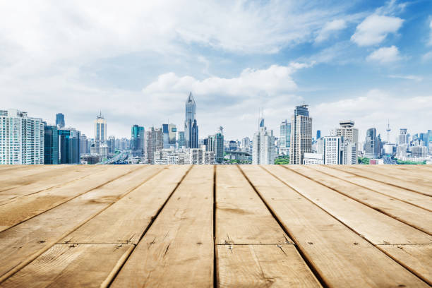 istock Panoramic skyline and buildings with empty wooden board 873878274