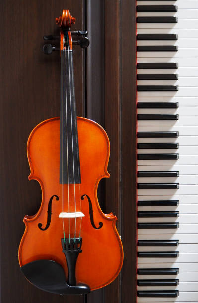 istock A violin next to the piano keyboard 873878510