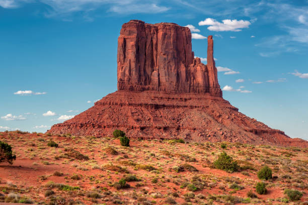Monument Valley The unique landscape of Monument Valley, Arizona - Utah, USA. butte rocky outcrop photos stock pictures, royalty-free photos & images