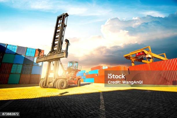 Loading And Unloading Of Containers In The Port On A Bright Sunny Day Stock Photo - Download Image Now