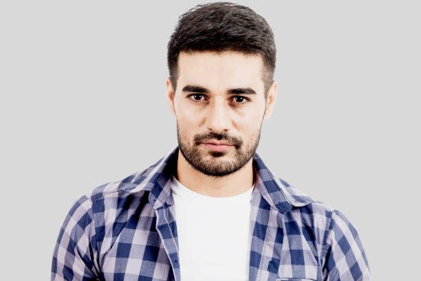 istock Portrait of handsome man on gray background 873886928