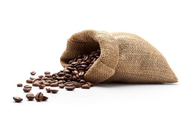 kaffeebohnen ergoss sich aus leinensack - brown coffee bag fotos stock-fotos und bilder