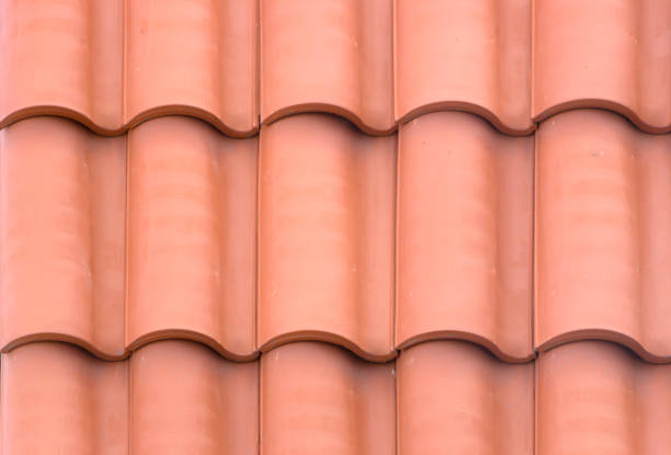 istock Red plastic roof tiles home 873891274
