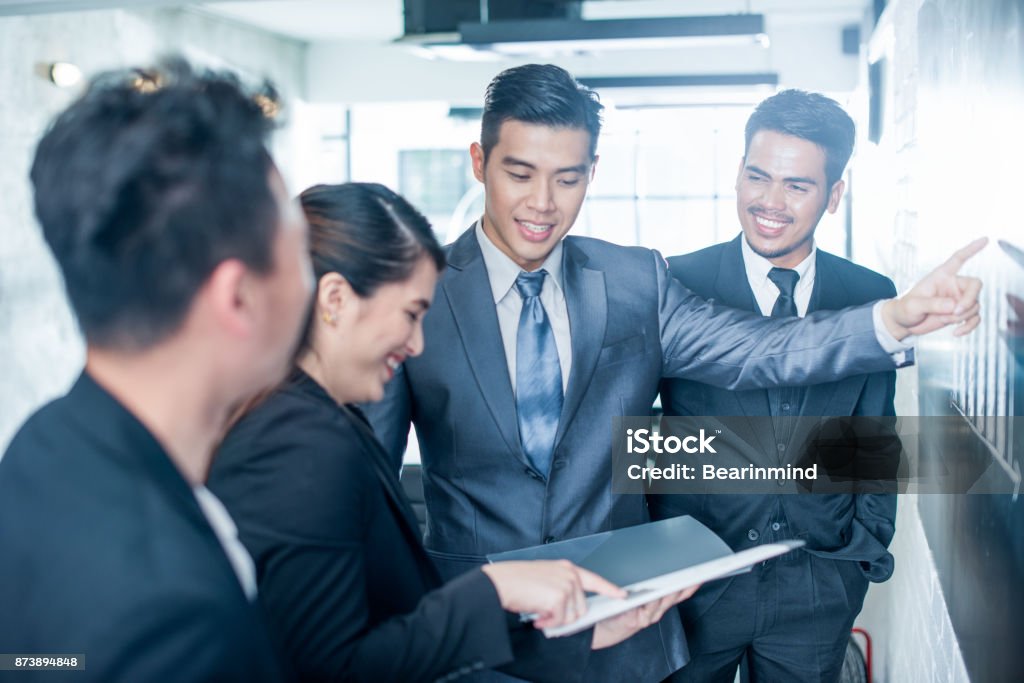 Asian Businessman Young Asian business people at work. Asia Stock Photo